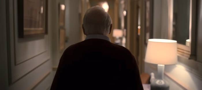 Anthony Hopkins walking down a hallway in &quot;The Father&quot;