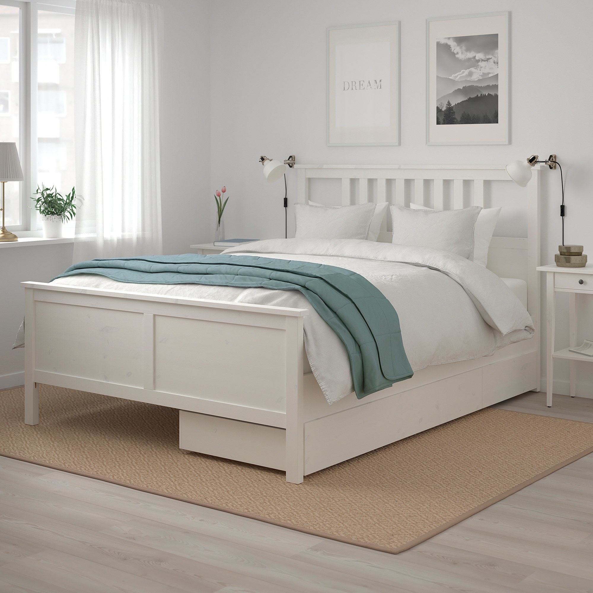 white bed frame with two storage drawers