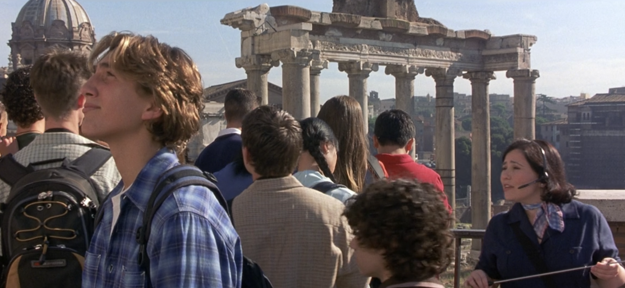 Ethan Craft walking by ruins in Rome