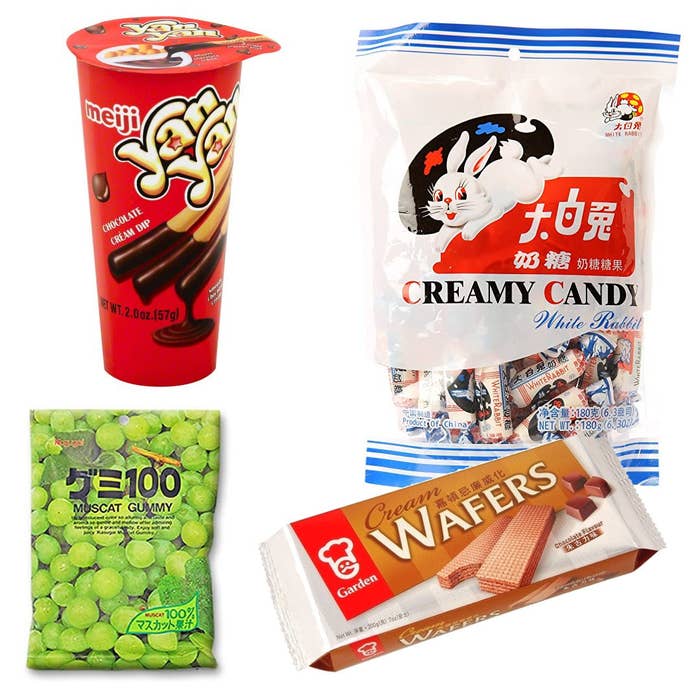 Assortment of Asian snacks including Yan Yan chocolate dip sticks, White Rabbit candy, Kasugai Muscat gummy and Garden cream wafers