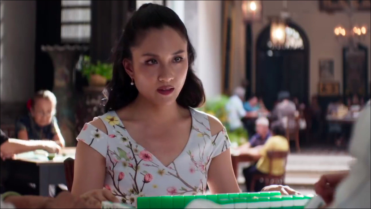 Constance Wu as Rachel Chu in &quot;Crazy Rich Asians&quot; sitting at a mahjong table