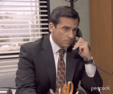 Michael Scott intensely answering the phone