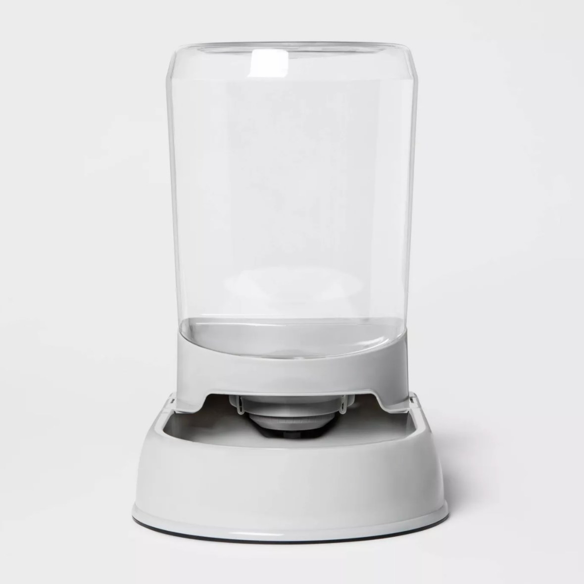 The pet water refiller in clear and gray plastic