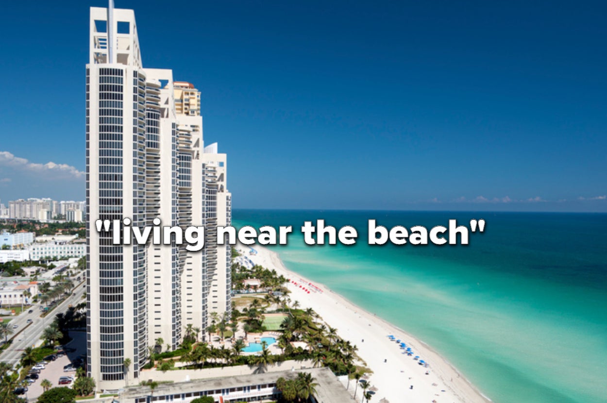A high-rise building on the Miami shoreline with the text "living near the beach" over it