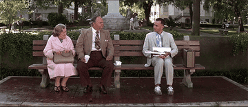 Forrest Gump giving a couple chocolate