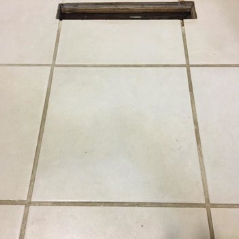 Reviewer's white tile and dark gray grout