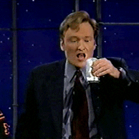 Conan O&#x27;Brien downing an entire can of beer messily 