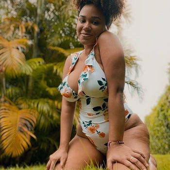 Reviewer wearing the white and floral version