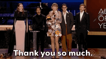 Taylor onstage at the Grammys for her acceptance speech