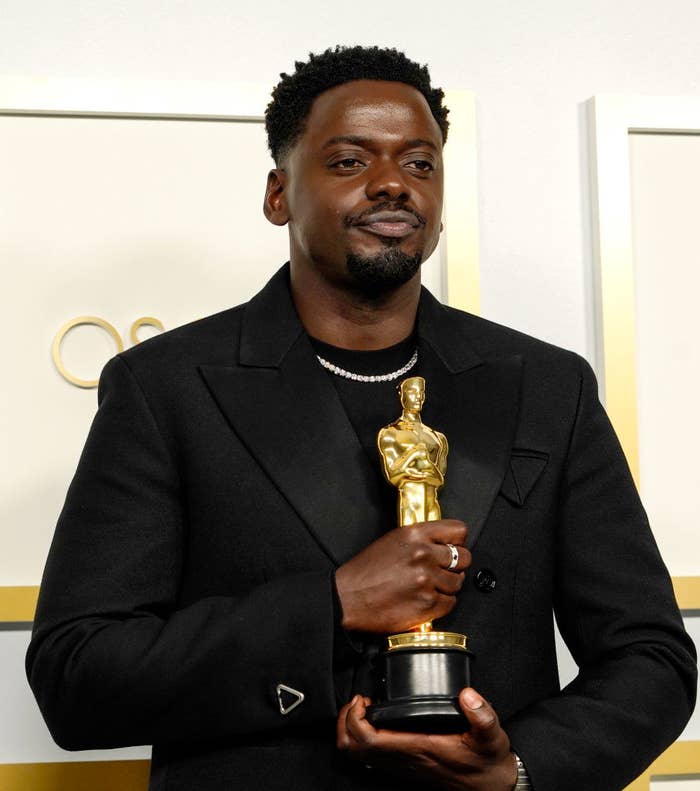 Daniel holding his Oscar backstage