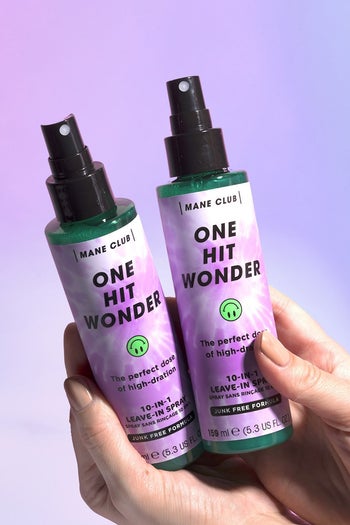 hands holding two bottles of the product