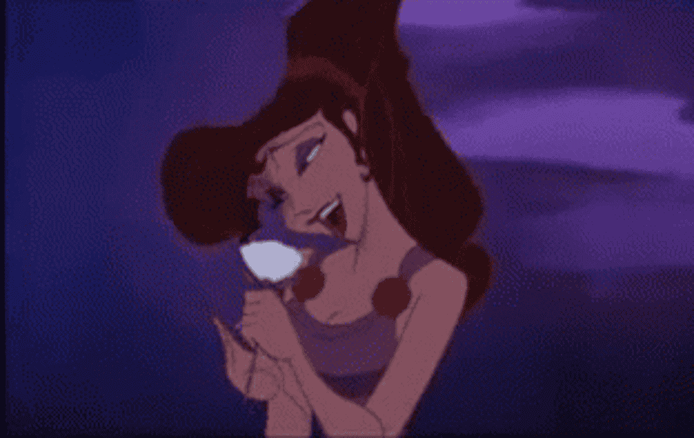A gif of Meg from Disney&#x27;s Hercules singing a love song