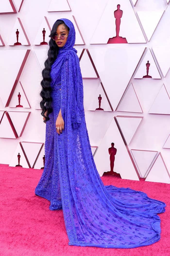 H.E.R. in a blue beaded outfit at the Oscars