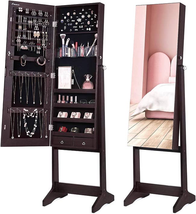 standing mirror with the inside revealing jewelry storage