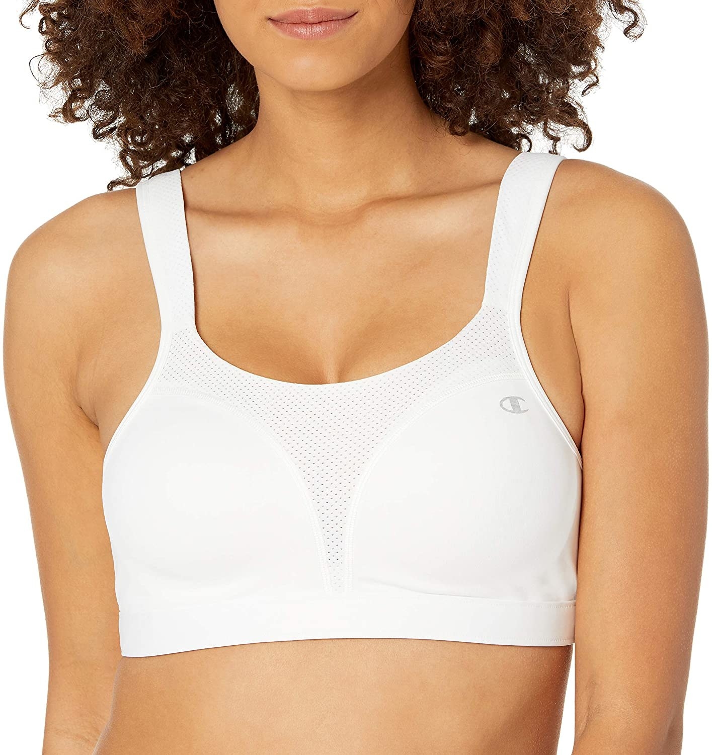 a model wearing the white champion sports bra