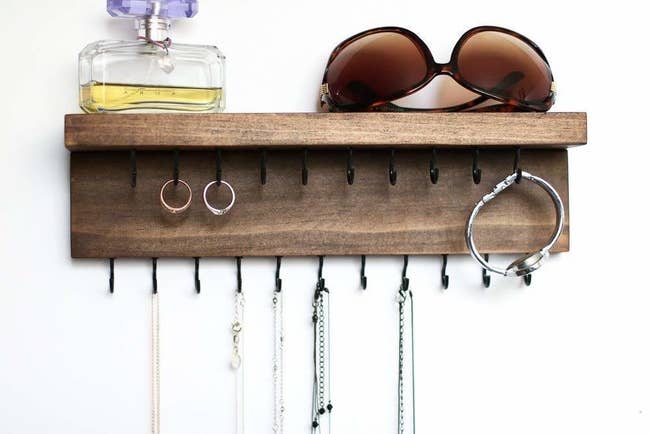 wood shelf with hooks for jewelry