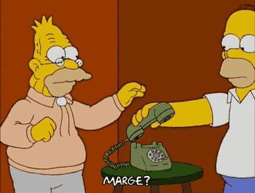 Homer Simpson picks up on the phone and asks if Marge is on the line