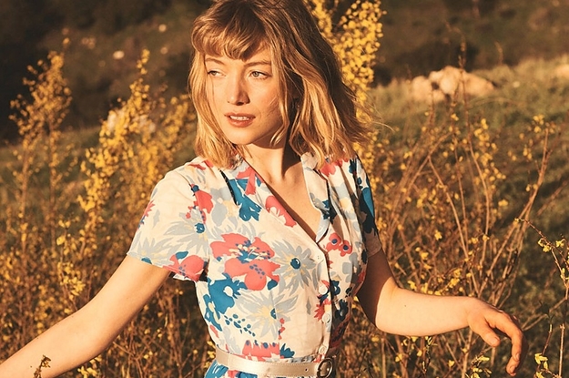 white, blue, and coral floral shirt dress worn by a model