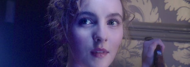 Penance Adair in The Nevers lit with blue light