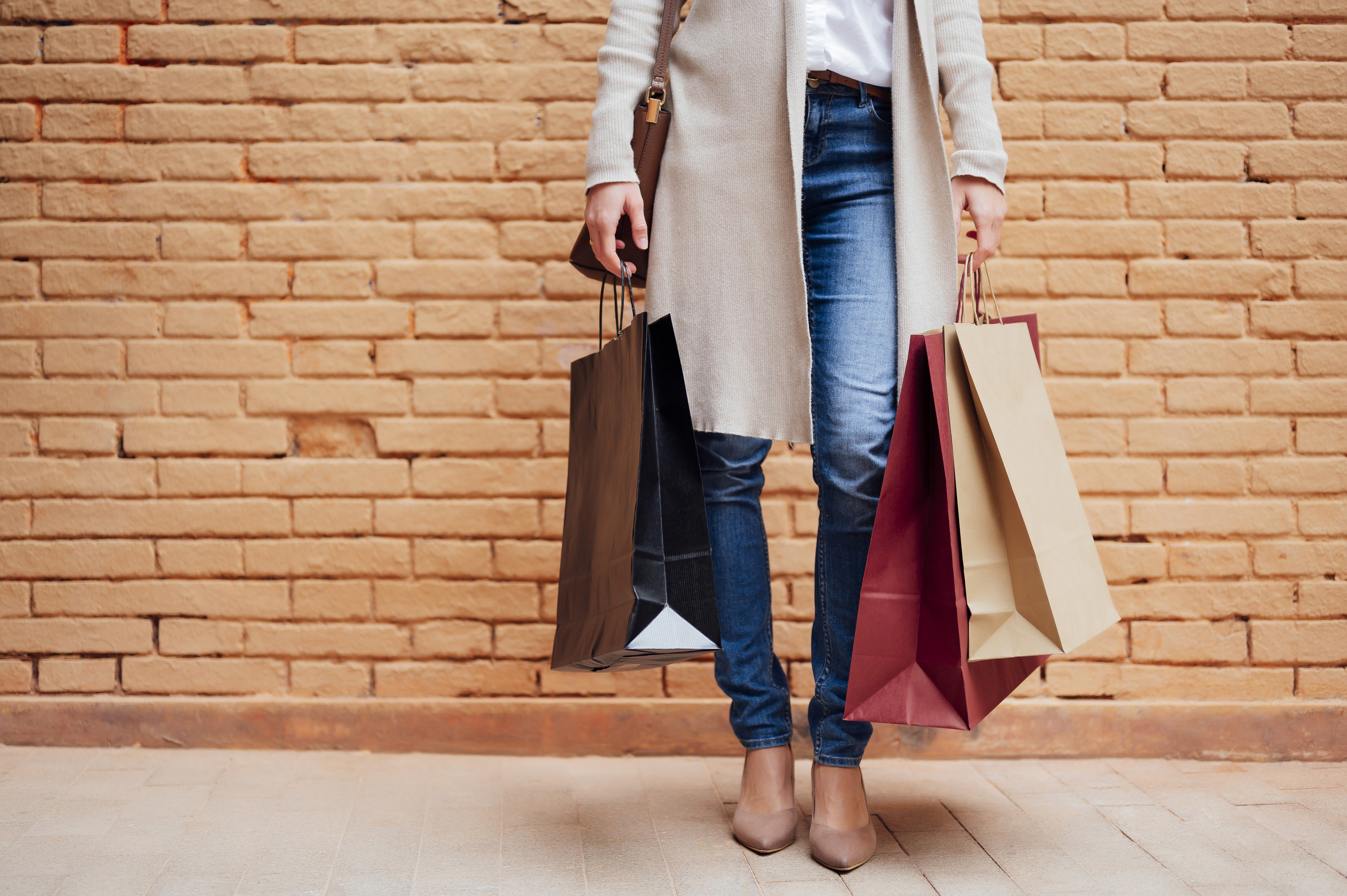 A woman holding shopping bags