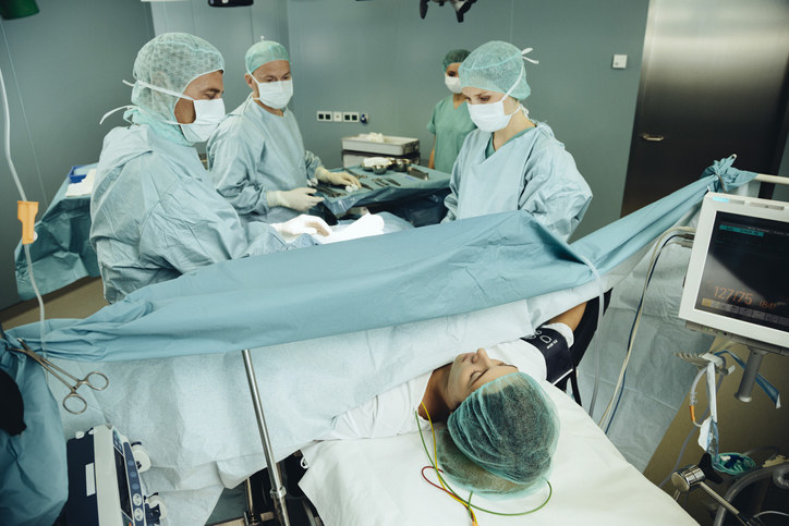 Stock image of a woman getting a c-section