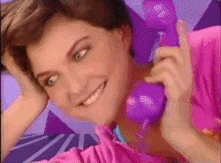 Teenagers in the 1980s talk to each other on cord phones