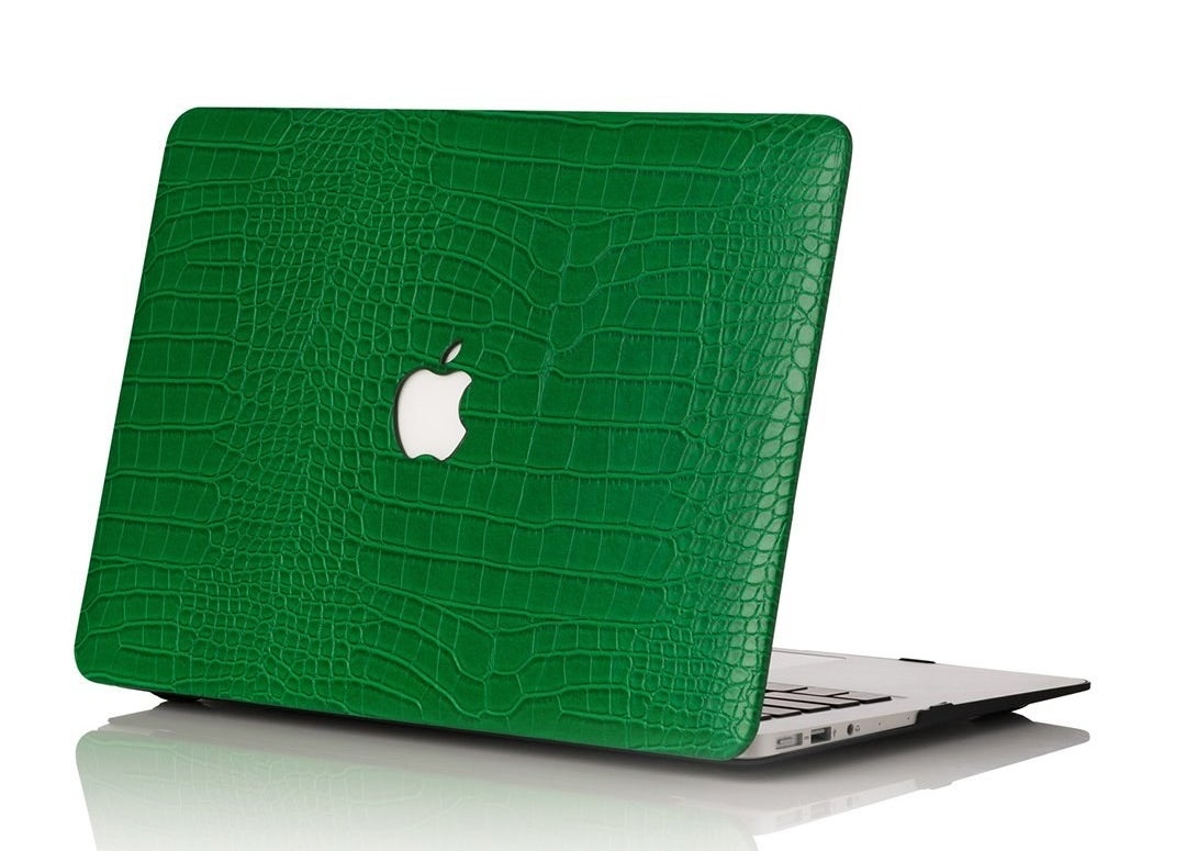 the green faux-croc case on a MacBook