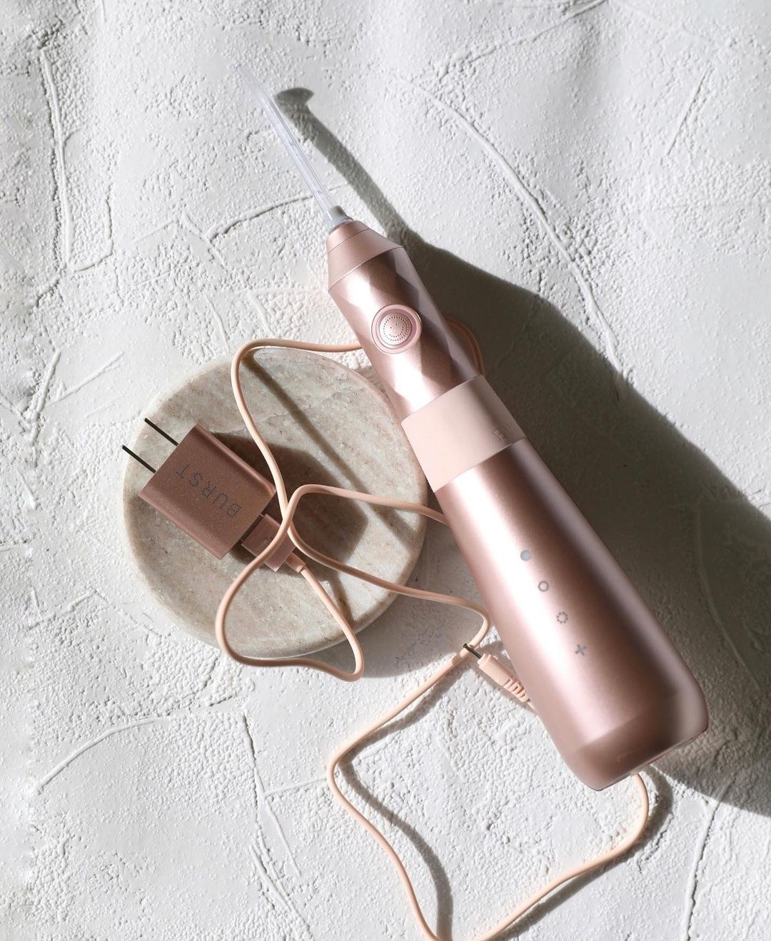 the rose gold water flosser