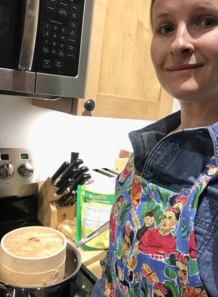 Woman in kitchen with apron on