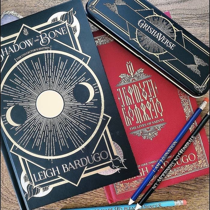 a special edition version of Shadow and Bone with a pencil case and some pencils