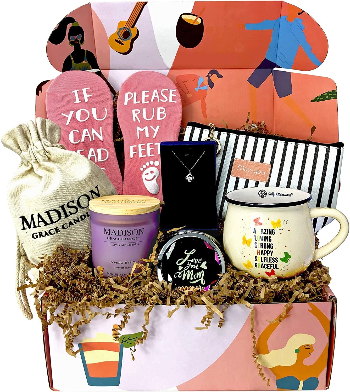 Full gift set showing socks, candle, mirror, mug, necklace, and cosmetic bag inside box