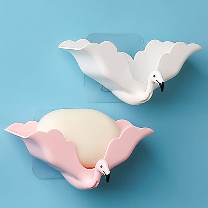 flamingo-shaped birds with soap bars that rest on wings mounted on wall