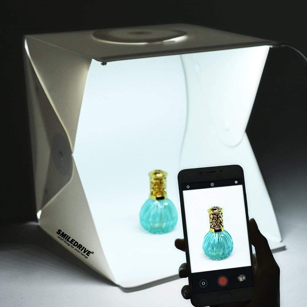 A perfume bottle inside the photo studio.