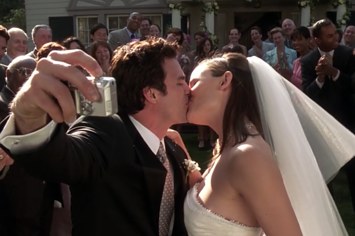 Matt and Jenna kissing on their wedding day