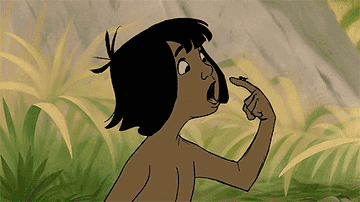 Mowgli trying to eat a bug