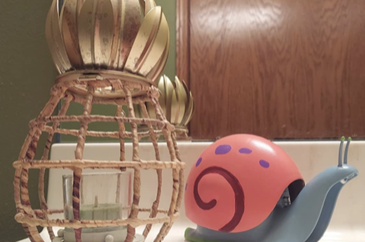 pineapple candle holder and snail-shaped soap pump