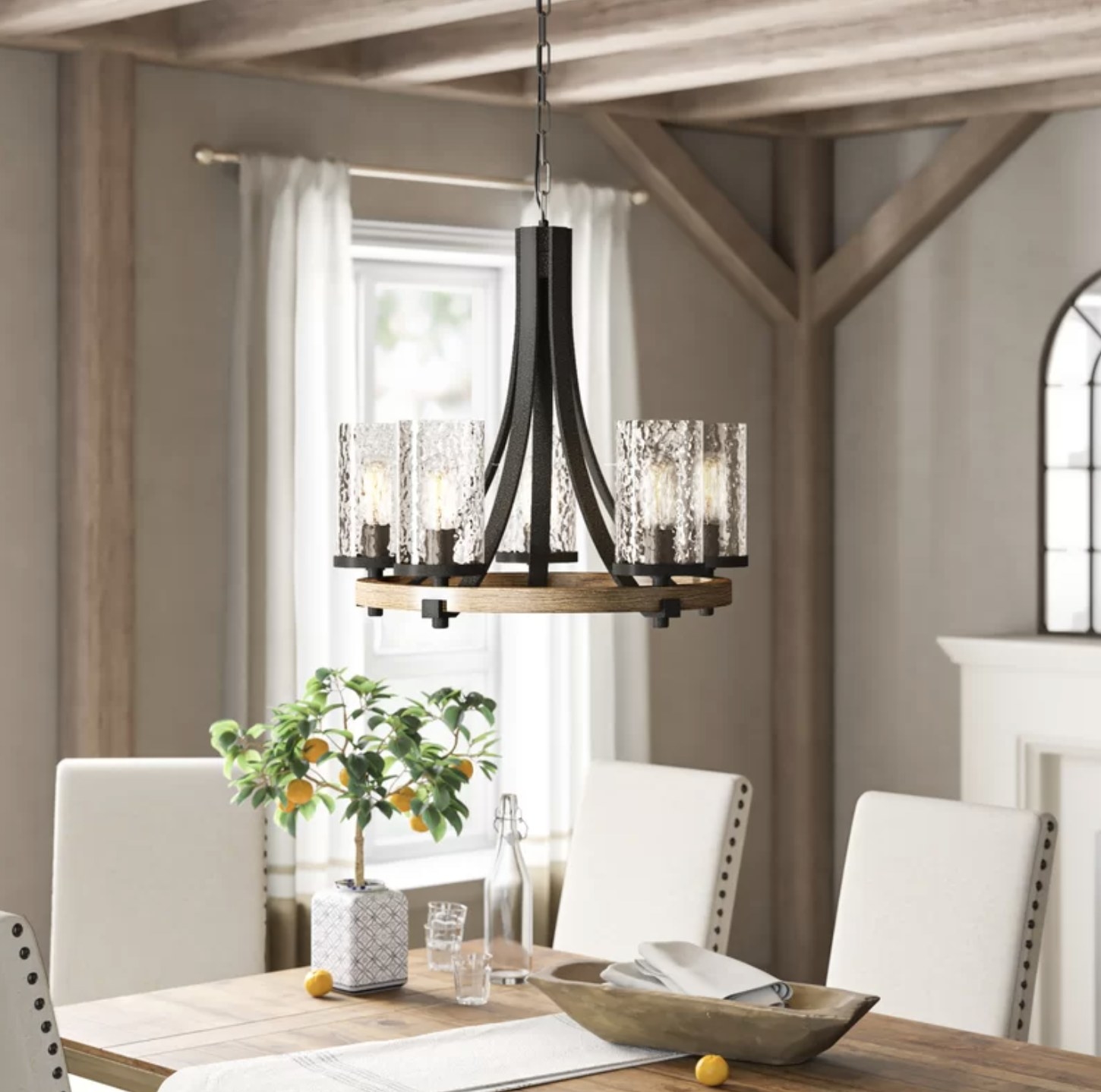 The chandelier above a dining room table