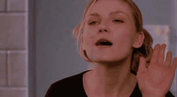 Kirsten Dunst from "Bring It On" gives a satisfying wave goodbye