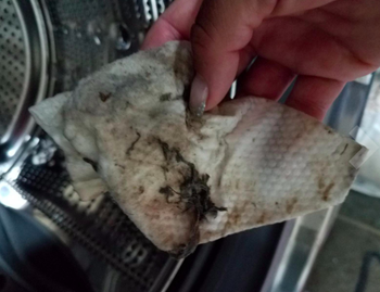 A customer review photo of a filthy used wipe