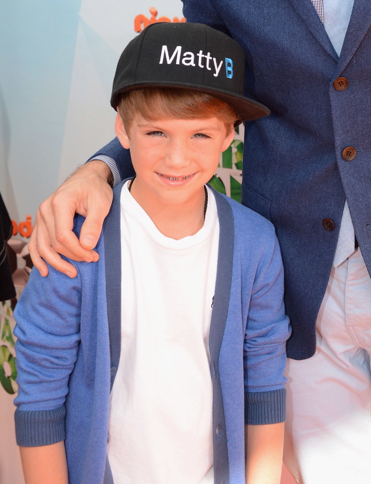 Matty B wearing a baseball cap that says &quot;Matty B&quot;