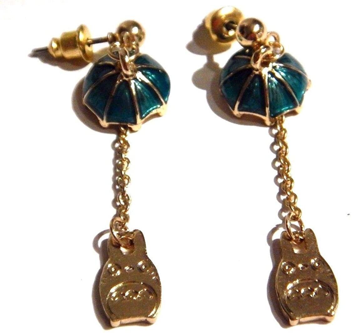 green and gold drop earrings each with a totoro charm hanging below an umbrella charm