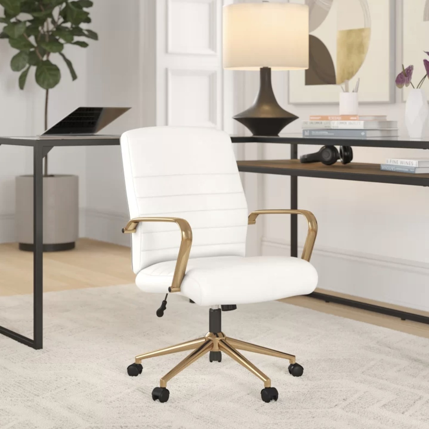 A white office chair with gold accents