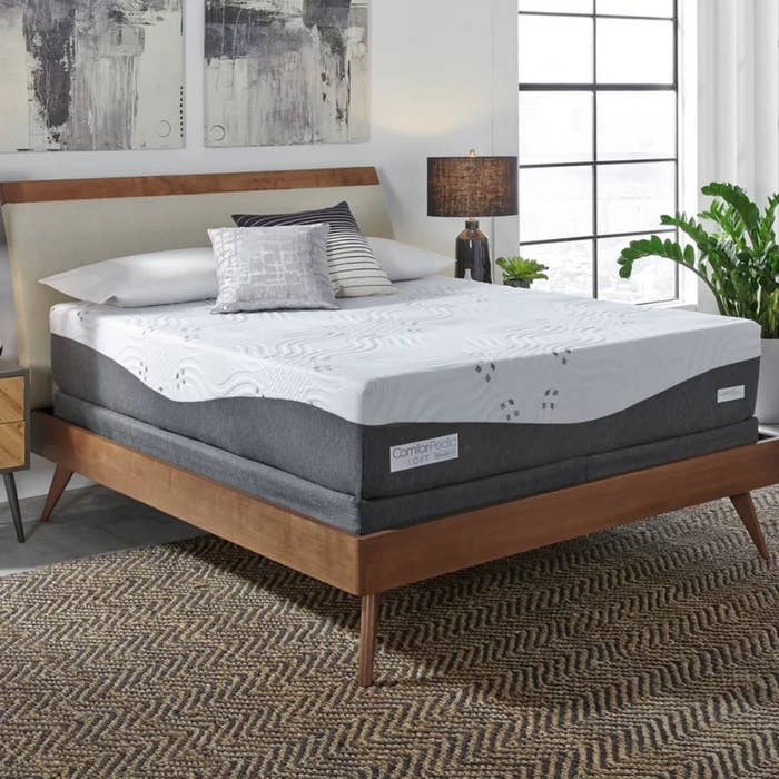 A 14-inch memory foam mattress displayed on a queen-sized bed