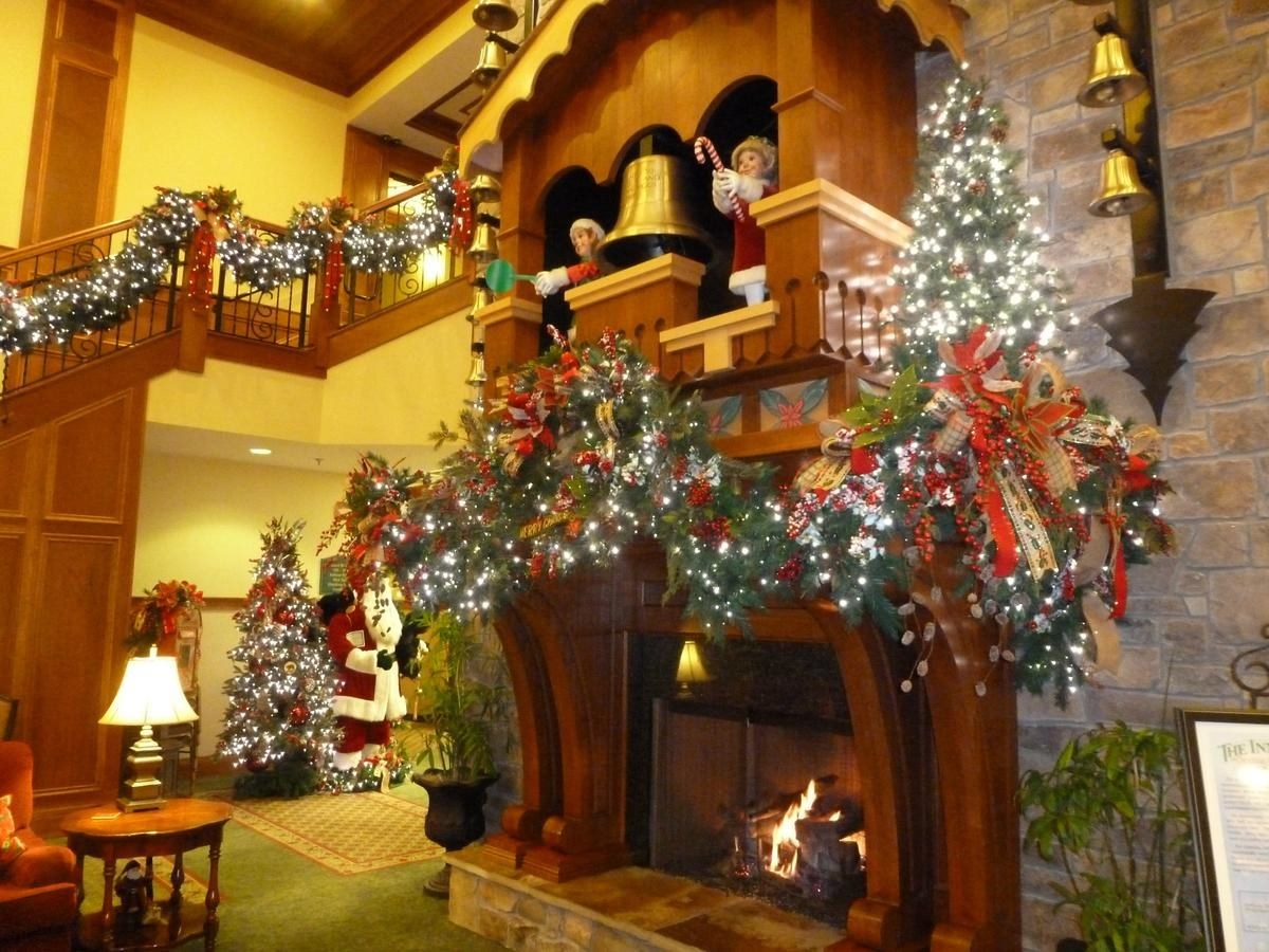 A fireplace covered in Christmas decorations