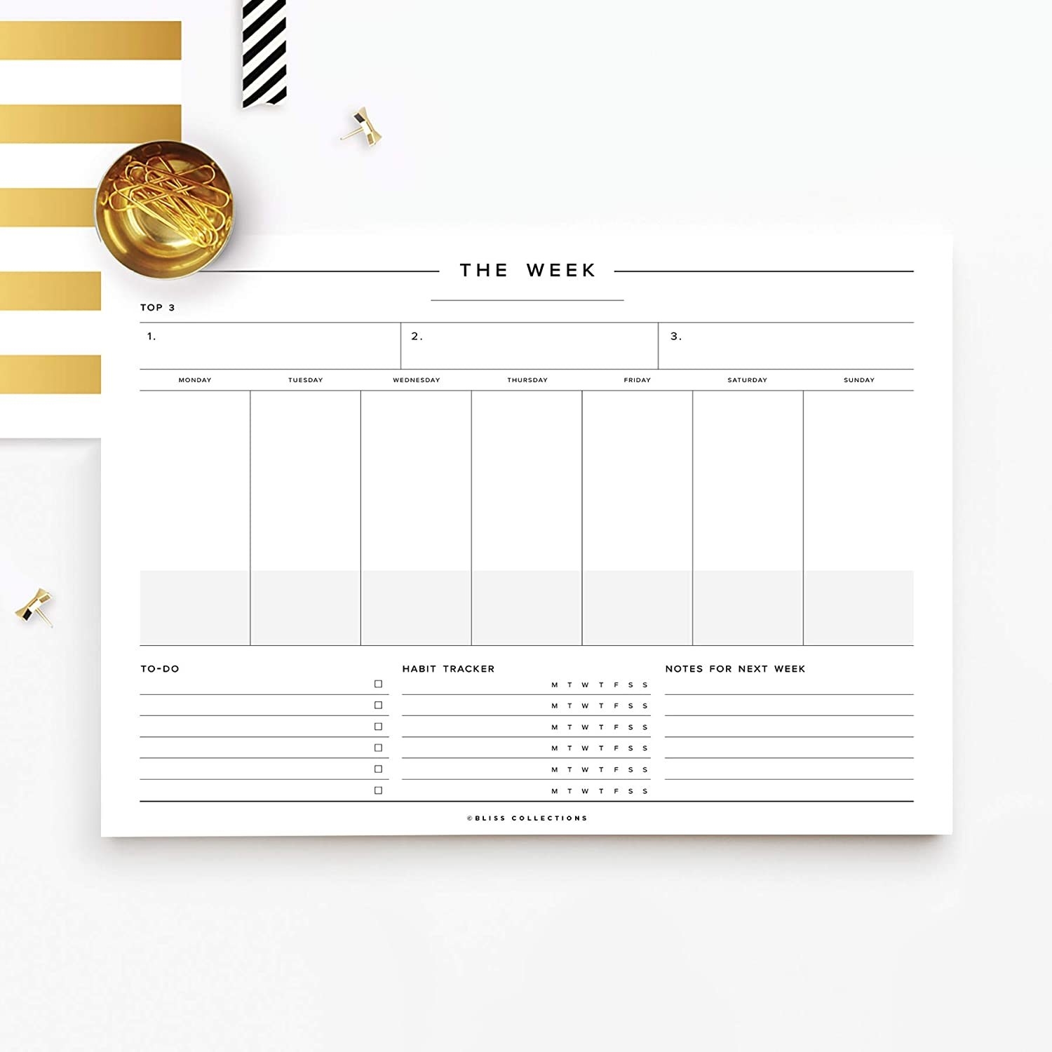 A black and white page with slots for each day, a to-do list, notes, and habit tracking
