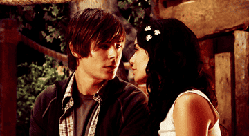 Troy and Gabriella looking at each other