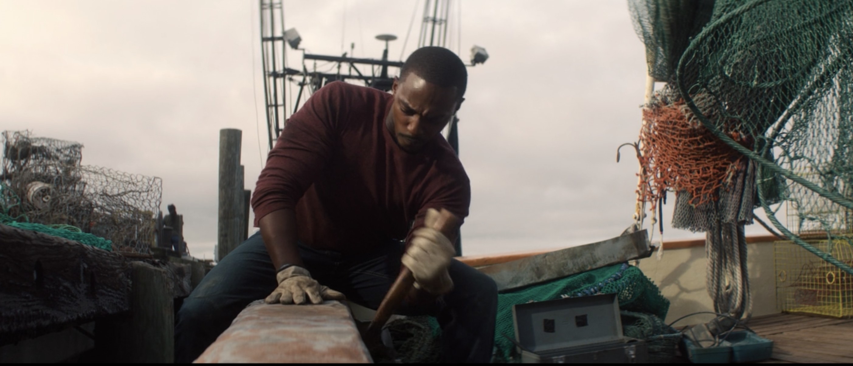 Sam Wilson helps fix the family boat