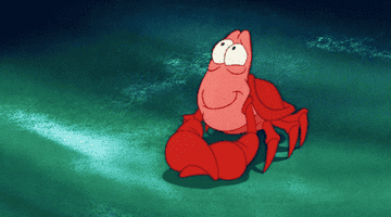 Sebastian from The Little Mermaid blinking up with pride 