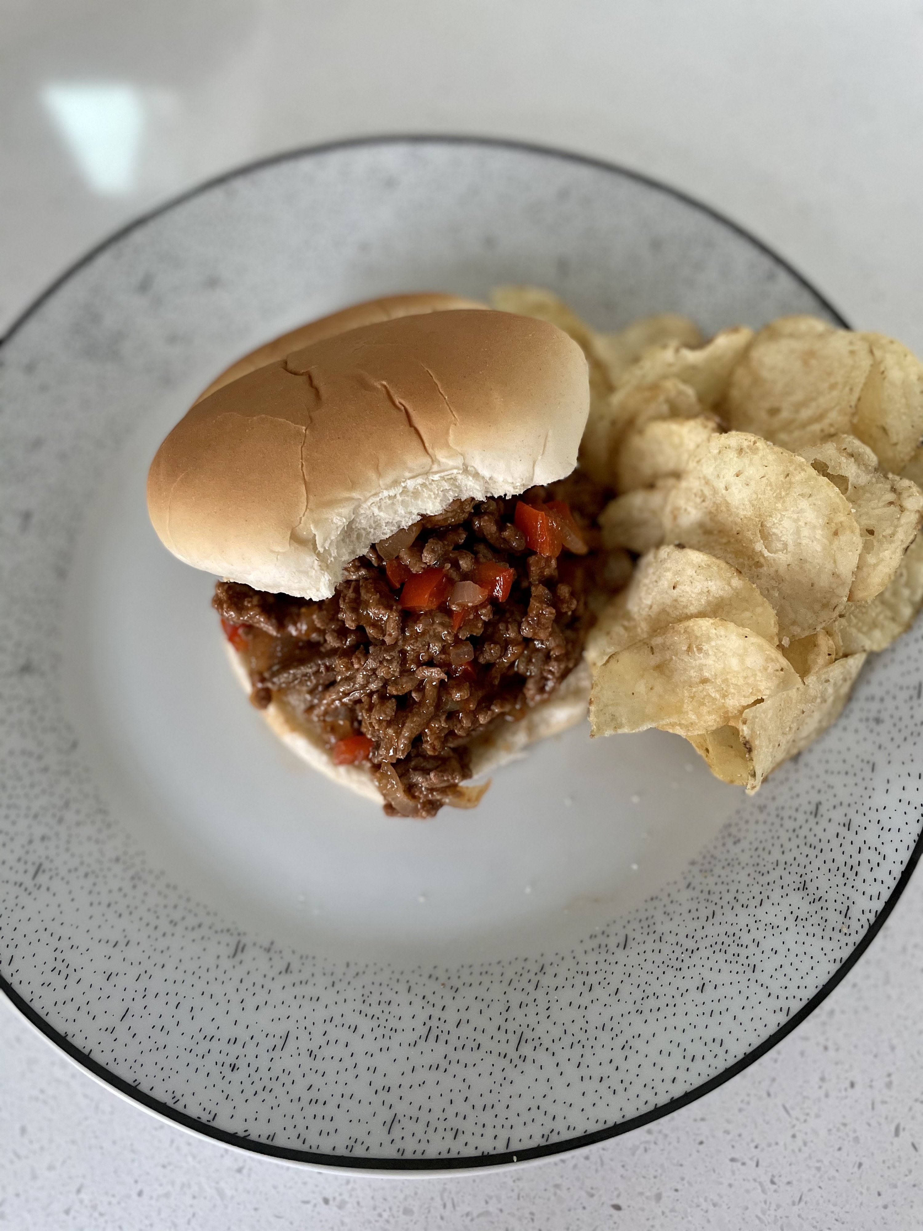 Sloppy Joes plated with potato chips