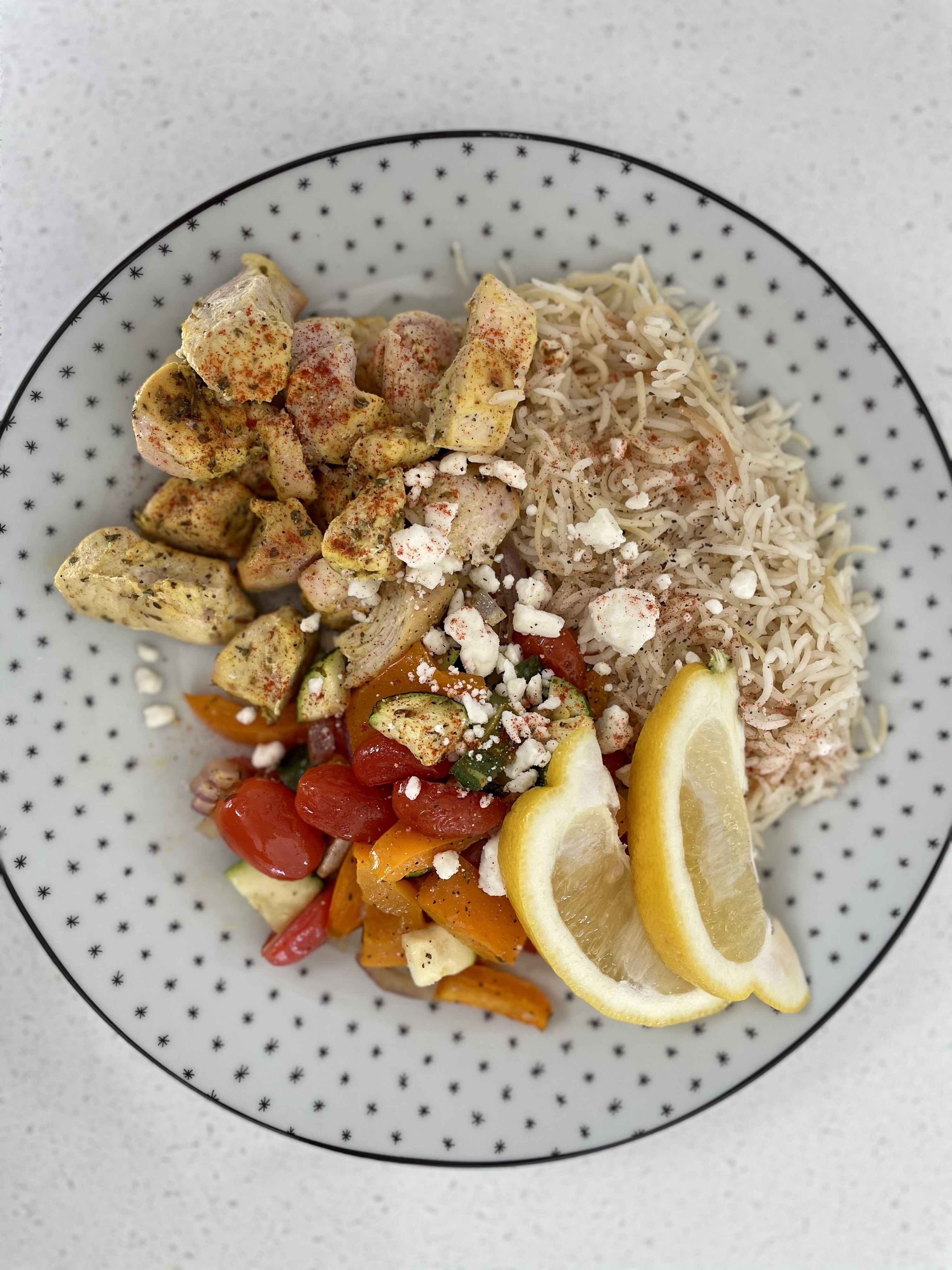 Greek chicken bowls plated